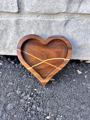 Small walnut heart-shaped jewellery tray with a raised lip and light maple and cherry inlay stripes