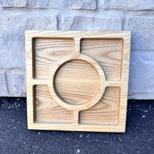 Square ash wood snack tray with four corner sections around a round centre section